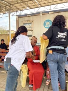 Giving gifts to the women at the Health centre