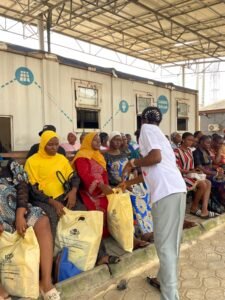 Handing out gifts to the women at the Health centre